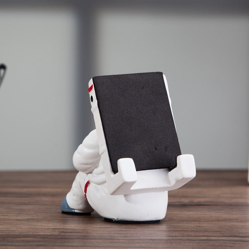 Support Téléphone Astronaute : Un Accessoire Fun et Pratique pour Votre Bureau