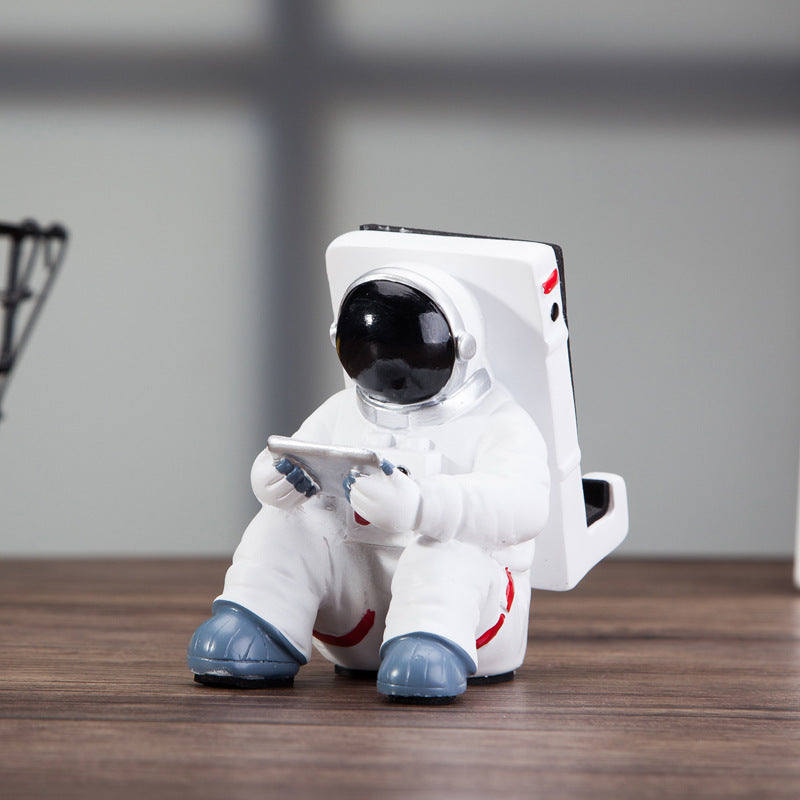 Support Téléphone Astronaute : Un Accessoire Fun et Pratique pour Votre Bureau