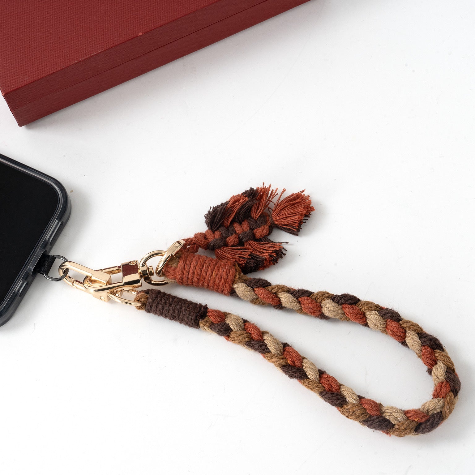 Lanière de téléphone tressée artisanale - Élégance et Praticité au Quotidien